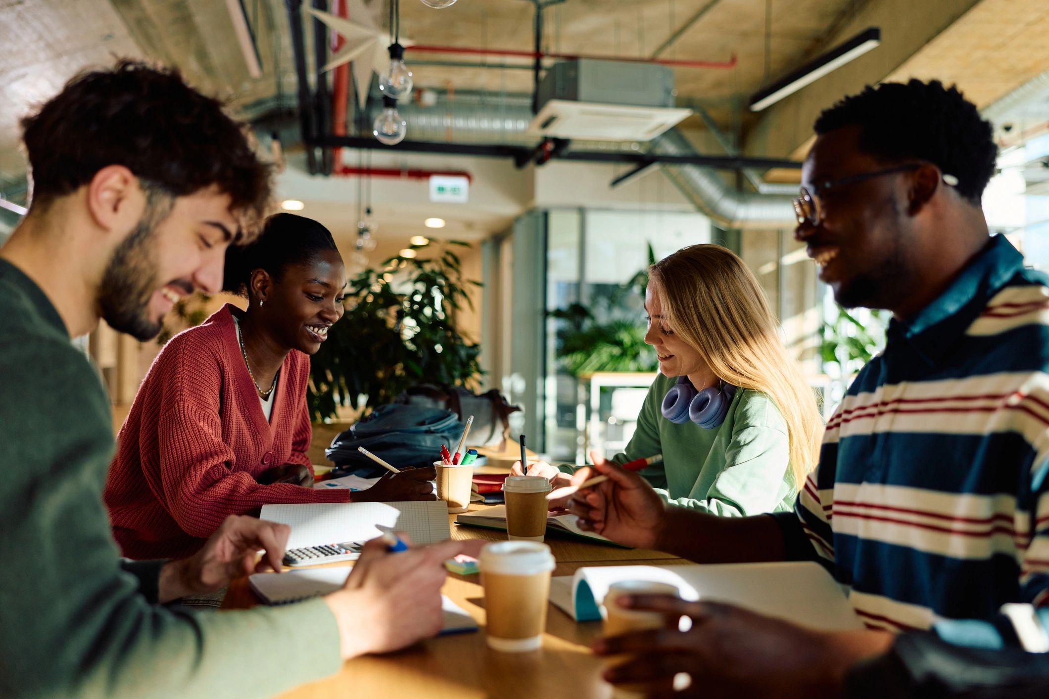 Students collaborating together in a university library